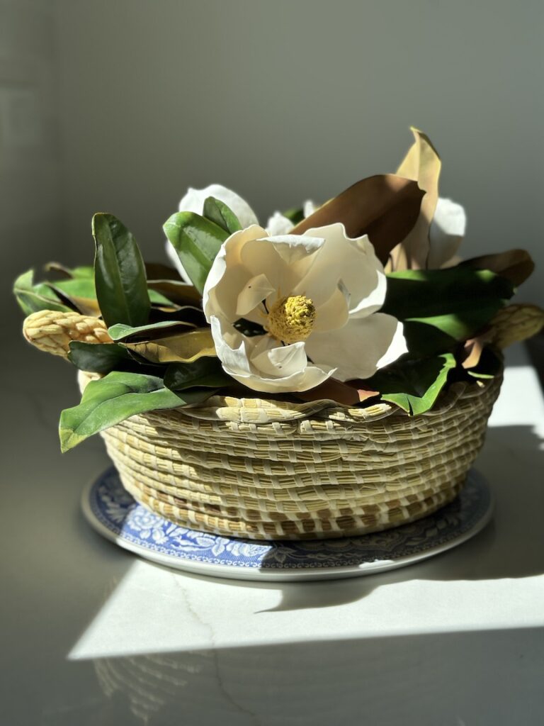 sweetgrass basket cake with sugar magnolia flowers
