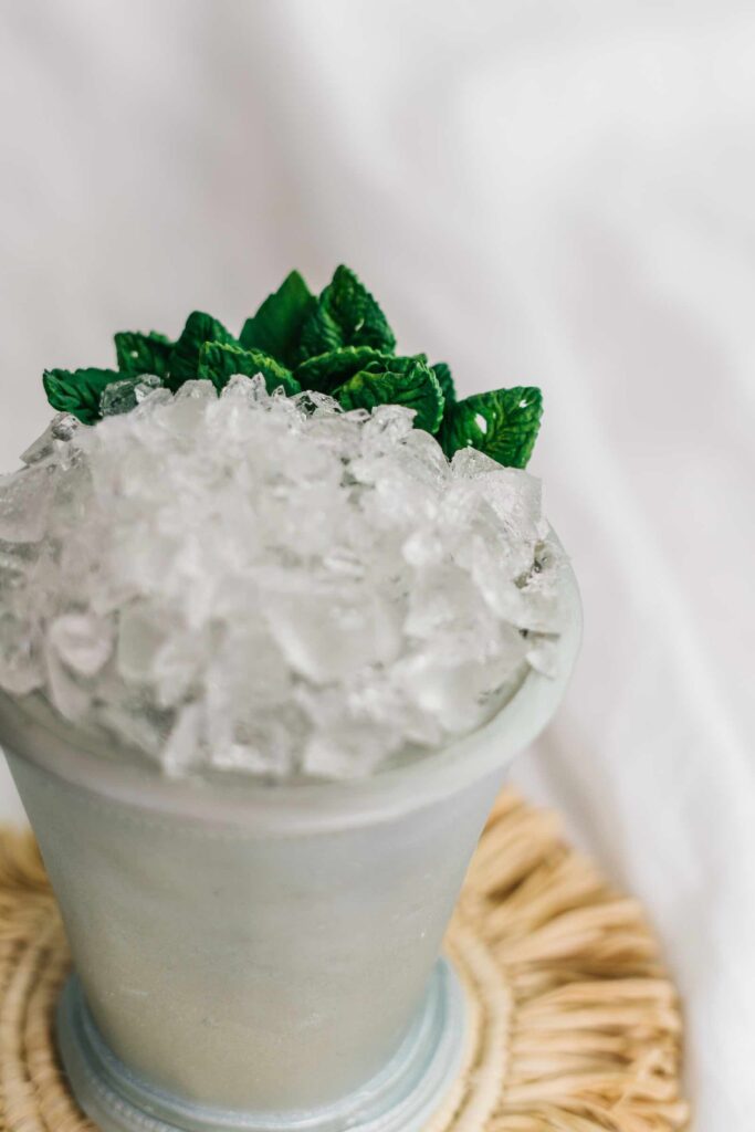 closeup of hyperrealistic mint julep cake